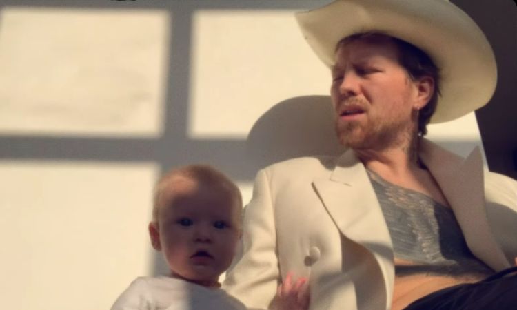 Alan Pownall with his son in a music video.